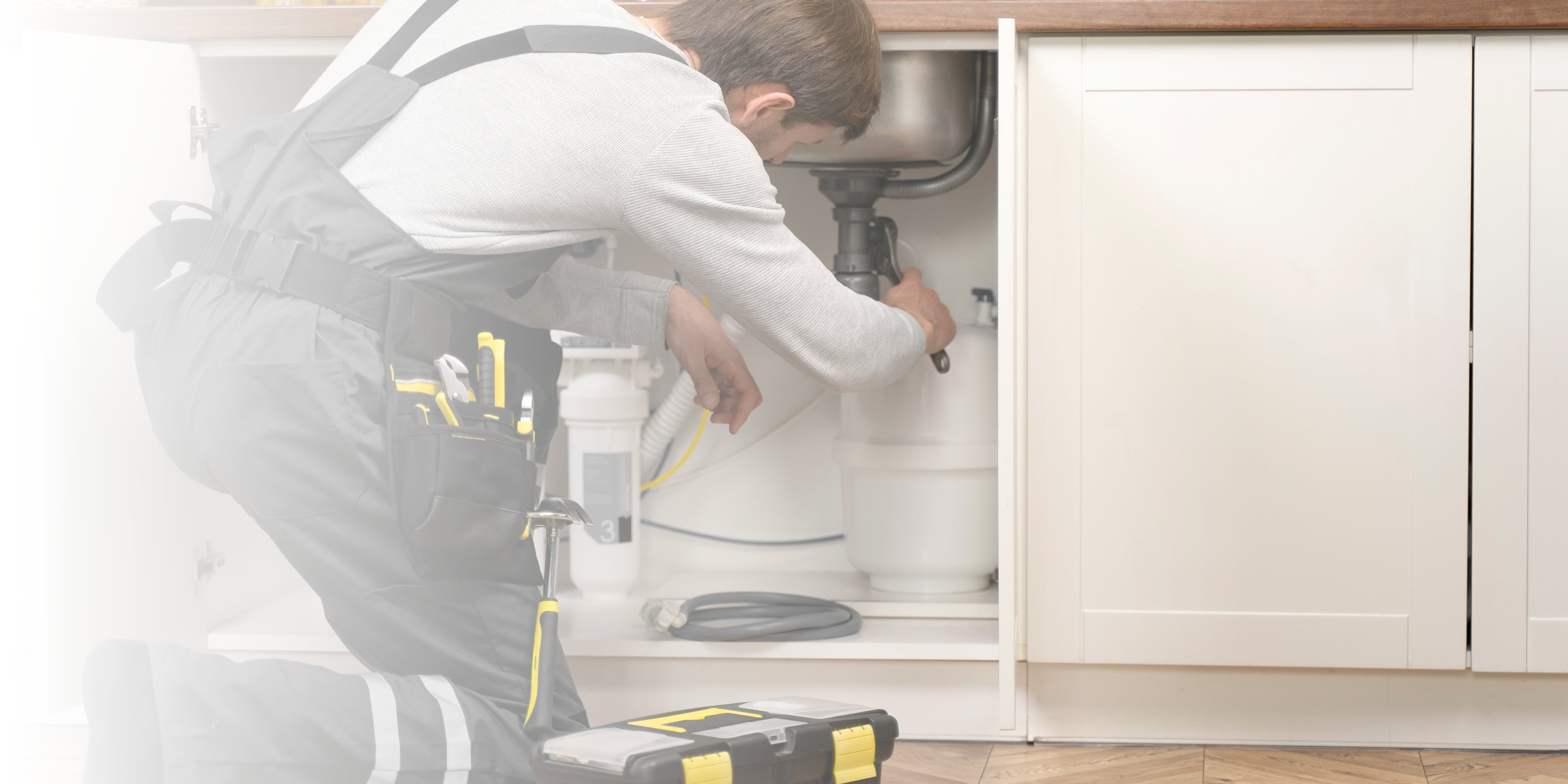 Expert plumber fixing blocked drains in Bristol